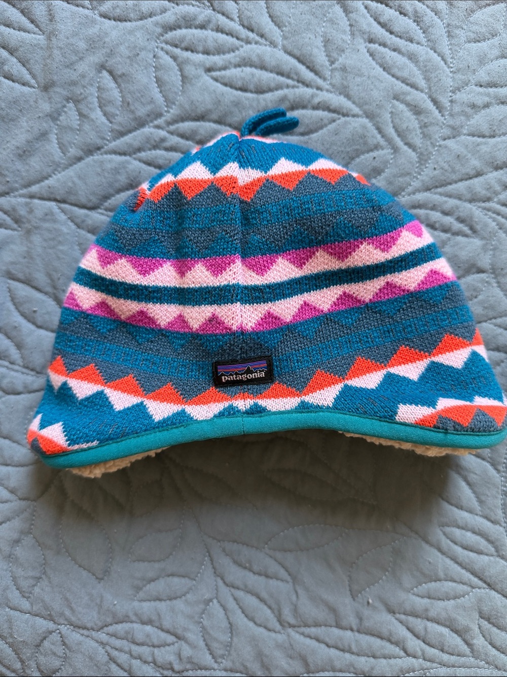 Patagonia Kids Teal Aztec Pattern Fleece-Lined Beanie with Pink & Orange Accents